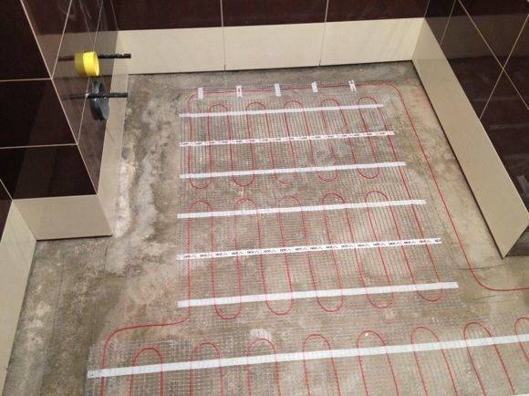 Теплый пол в ванной под плитку: правила монтажа и методика проверки на работоспособность
