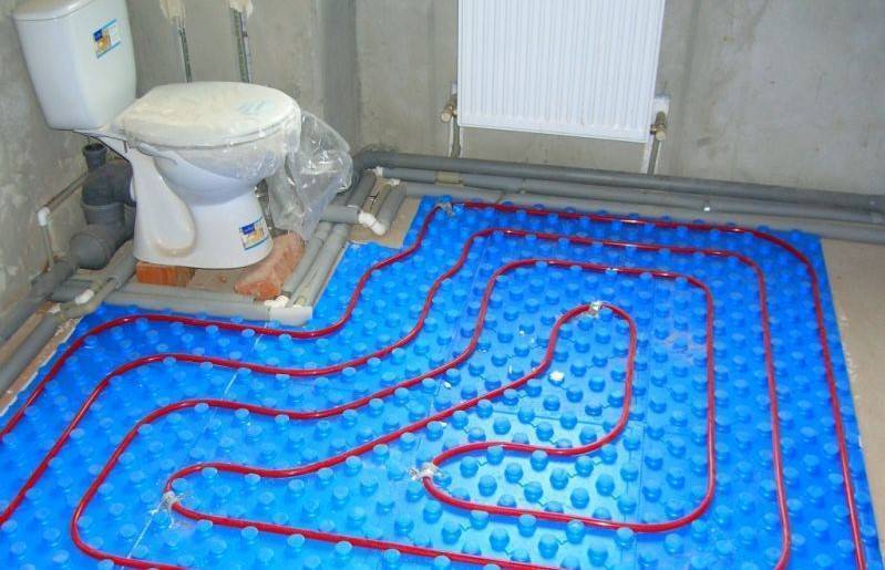 Теплый пол в ванной под плитку: монтаж электрической и водяной системы самостоятельно